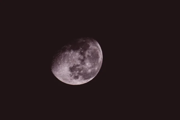 Luna sobre un fondo negro —  Fotos de Stock