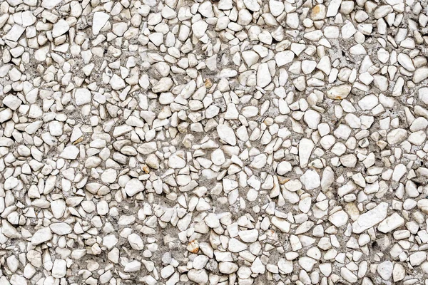 Textur av små vita stenar — Stockfoto
