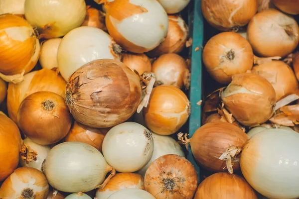 Textura de cebolla fondo venta de verduras en el mostrador de la tienda de mercado minimarket — Foto de Stock