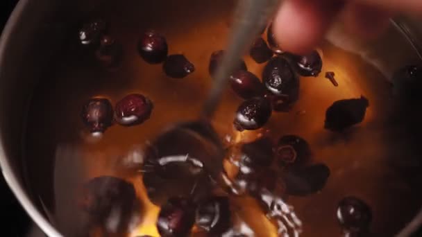 Preparation of boiled rose hips. rosehip is the richest fruit in the world in terms of vitamin C — Stock Video