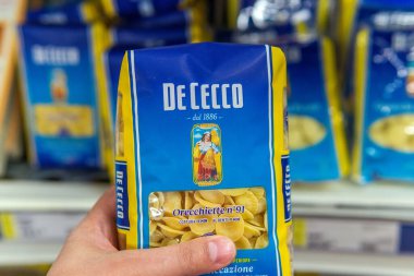 Tyumen, Russia-June 05, 2020: Packaging packaging of De Cecco macaroni products of various brands on the store shelf clipart
