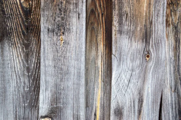 深褐色木制的旧栅栏板 木材的结构 — 图库照片