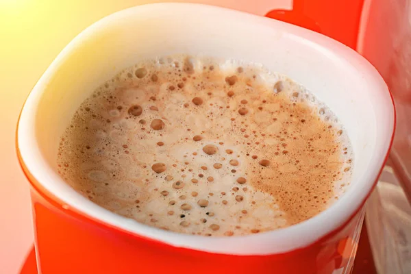 Coffee foam texture close up in cup on top view. macro shop of coffee foam. Breakfast, caffeine, selective focus