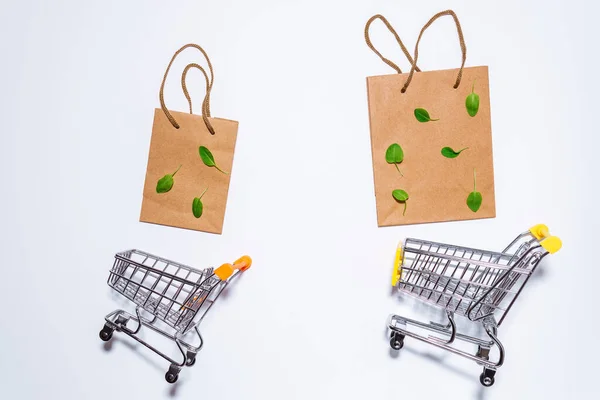 Paper craft bag Responsive design mockup. Flat lay, top view. Recycled paper shopping bag, copy space. Eco shopping concept.