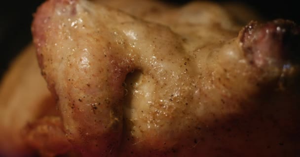 Preparation of whole fried crispy chicken with spices in the oven, cooked in an electric stove. — Stock Video