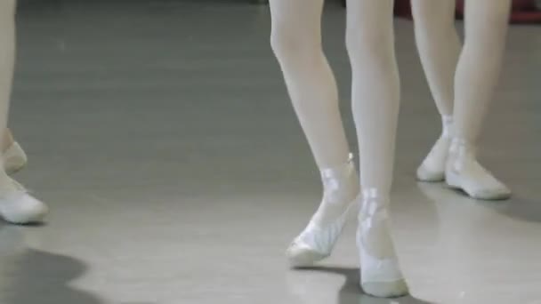 Ballet. Close-up of a girls legs in white ballet shoes during ballet training. Element of classical dance. 4K. — Stock Footage Ballet. Close-up of a girls legs in white ballet shoes during ballet training. Element of classical dance. 4K. Royalty Free Stock Video