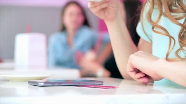 Beautiful Sunny Day Young Woman Drinks Morning Coffee in a Cafe, Making Online a Purchase Easy Payment on the Internet Using a Mobile Phone or Laptop. — Stock Video