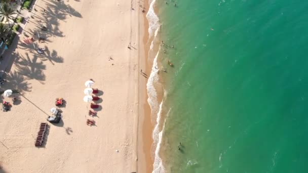 Aerial view of the beach from above, few people, the beach after quarantine, after the Covid-19 pandemic. — Stock Video