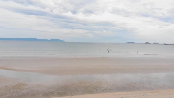 Birds-eye view of beach, small number of unknown people on the beach,beach after quarantine, after the Covid-19 pandemic,Concept of people, recreation, beaches. — Stock Video