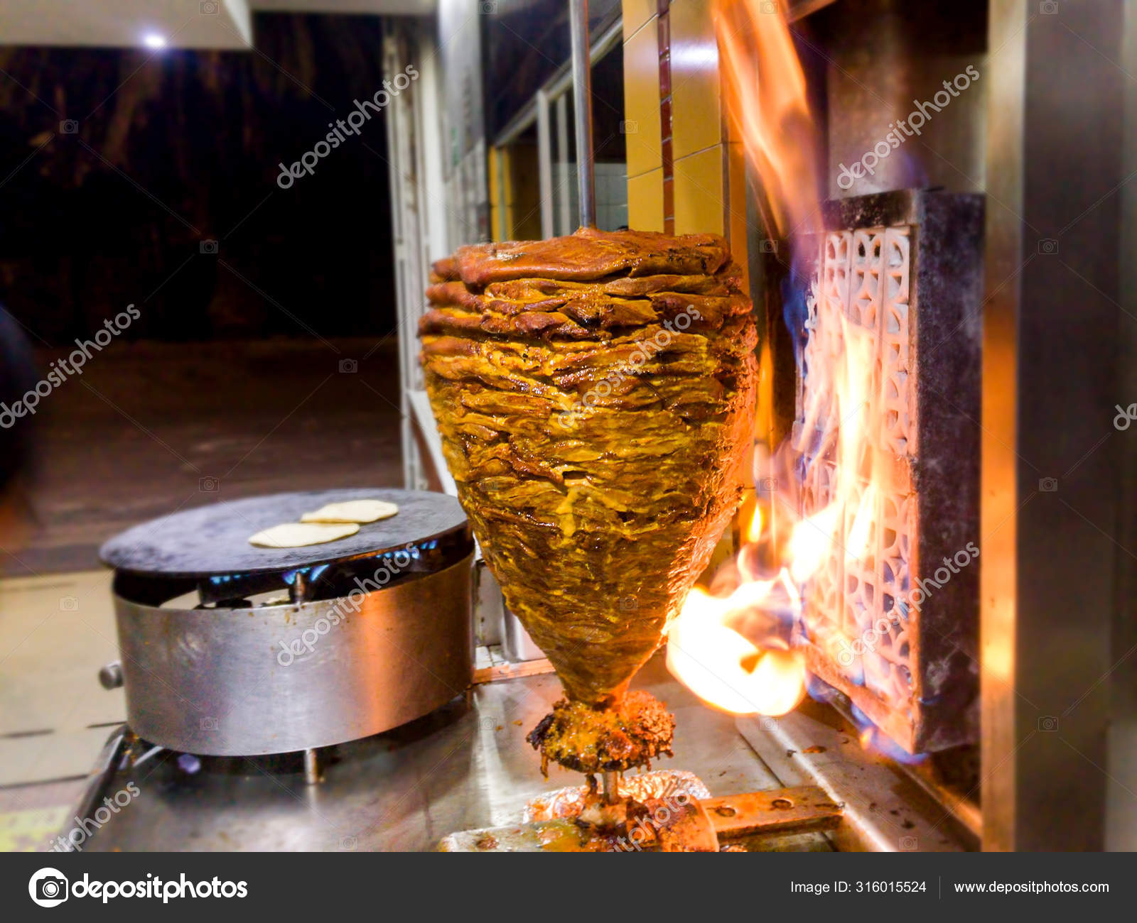 Mexican Tacos Trompo de Pastor Stock Photo by ©ZSuriel 316015524