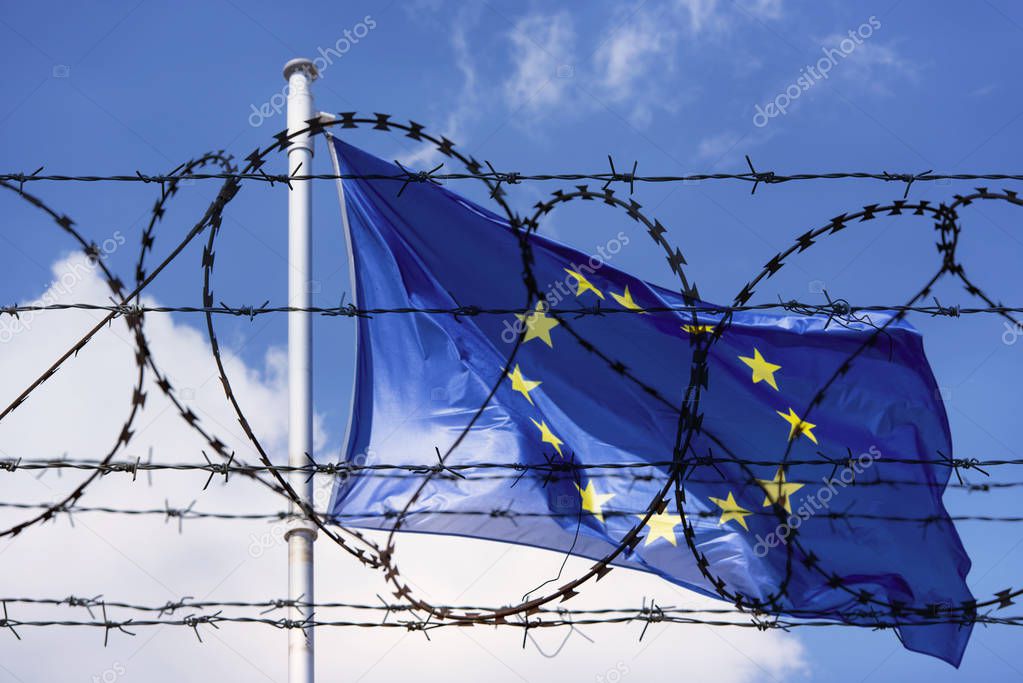 EU Flag and fence with barbed Wire concept Picture