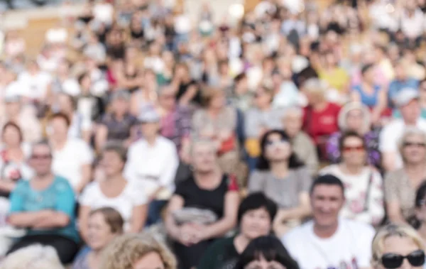 Large Group of People, Crowd of audience, blurred and defocused as background