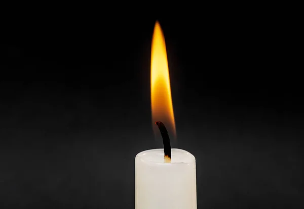 Candle Flame Fire isolated on Black Background with Soft Smoke