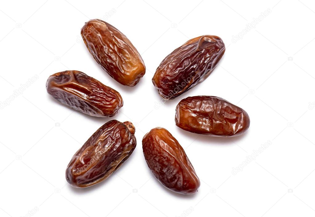 Top view of natural sweet Dates isolated on white Background