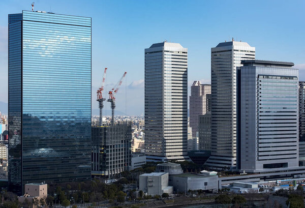 OSAKA - JAN 11: Japan city skyline, modern districts of Osaka city on January 11. 2017 in Japan
