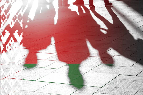 Belarus flag and shadows of people, concept picture about votes and political situation in Belarus