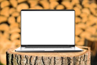 Laptop with blank screen in the forest. clipart