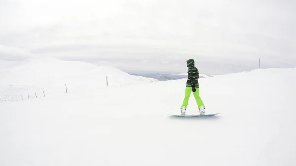 Girl Rides Snowboard Mountains Lots Snow Carpathians Ski Jacket Trousers — Stock Photo, Image