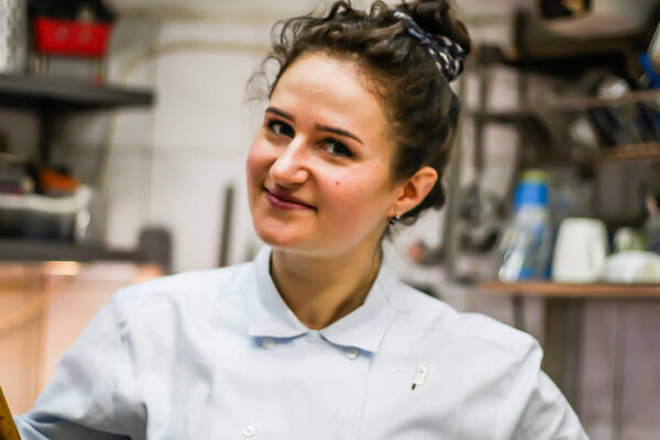 Portrait of Chef's Girl. In the kite in the kitchen.