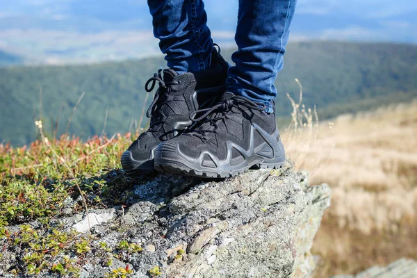 Trekking shoes. Boots for mountains. Hiking in the mountains. Ca