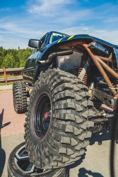 Off-road tuned car. Lift car. Large tires for the swamp
