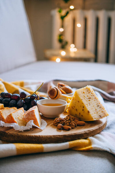 Cheese board, assorted cheese, comfort wine party dinner