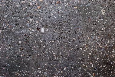 Küçük taşlarla beton zemin arka plan dokusu.