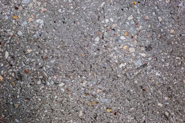 Küçük taşlarla beton zemin arka plan dokusu.