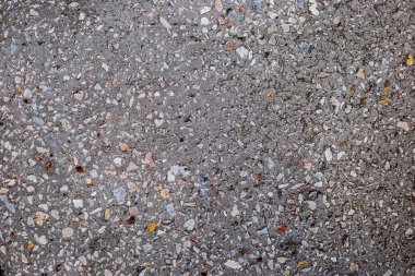 Küçük taşlarla beton zemin arka plan dokusu.