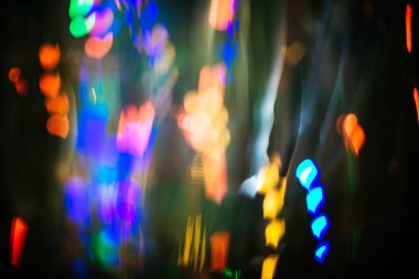 Bulanık renkli Noel bokeh arka plan kalp şekli soyut. Tonda, tarzı fotoğraf.