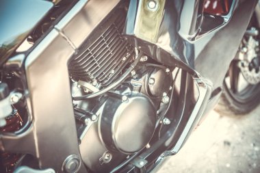 Kırmızı spor motosiklet parçası. Tonda, tarzı glamour fotoğraf.