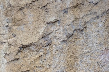 Kil ve saman yapılmış eski bir ev eski bir duvar dokusu.