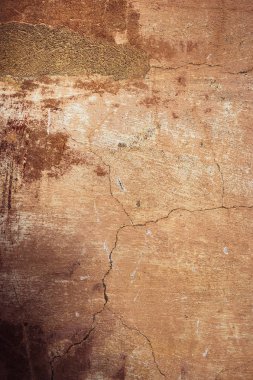 Çatlak ve eski duvar arkaplanı boyası soyulmuş. Klasik grunge dokusu