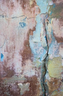 Çatlak ve eski duvar arkaplanı boyası soyulmuş. Klasik grunge dokusu