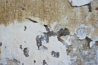 Çatlak ve eski duvar arkaplanı boyası soyulmuş. Klasik grunge dokusu