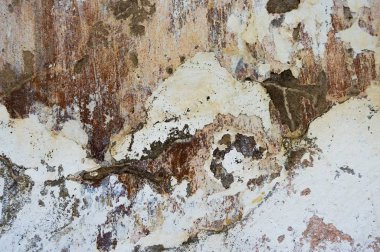 Çatlak ve eski duvar arkaplanı boyası soyulmuş. Klasik grunge dokusu