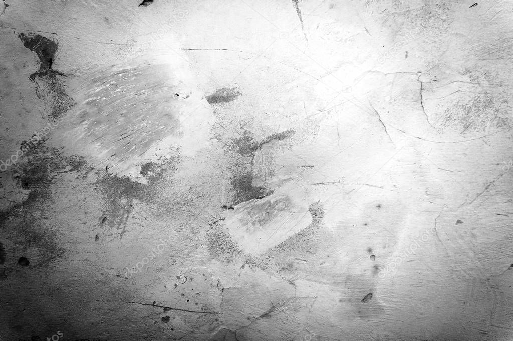 Old cracked stone wall background for design. Grunge monochrome classic texture.