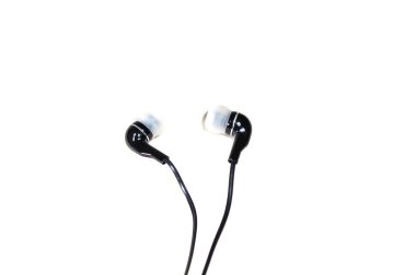 Bir çift veya beyaz bir arka plan üzerinde izole kulaklık. Küçük kulaklıklar müzik için.