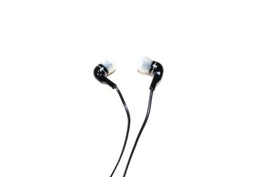 Bir çift veya beyaz bir arka plan üzerinde izole kulaklık. Küçük kulaklıklar müzik için.