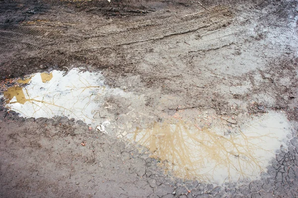 Відбитки шин у грязі — стокове фото