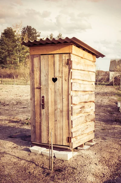 Wooden toilet in a village — Stock Image Wooden toilet in a village Royalty Free Stock Photos