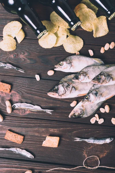 Dried Fish Perch Bleak Chips Crackers Nuts Three Brown Glass — Stock Photo, Image