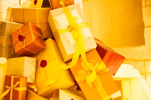 gold present boxes package with silver ribbons as holiday gift boxes for festive giving seasons. Thanks, Happiness, Sharing, Festival, Holidays, Special Occasion Events and New Year Raffle concept