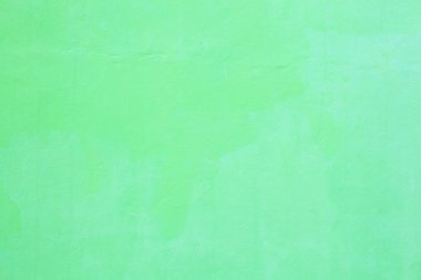 dokulu taze boyalı ışık yeşil renkli düz sorunsuz grunge kaba duvar arka planda rustik Asya evi sıvalı. Ev iç mimari tasarım, duvar kağıdı, döşeme ve zemin kavramı