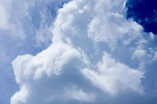 Hot weather causes clusters of white clouds.