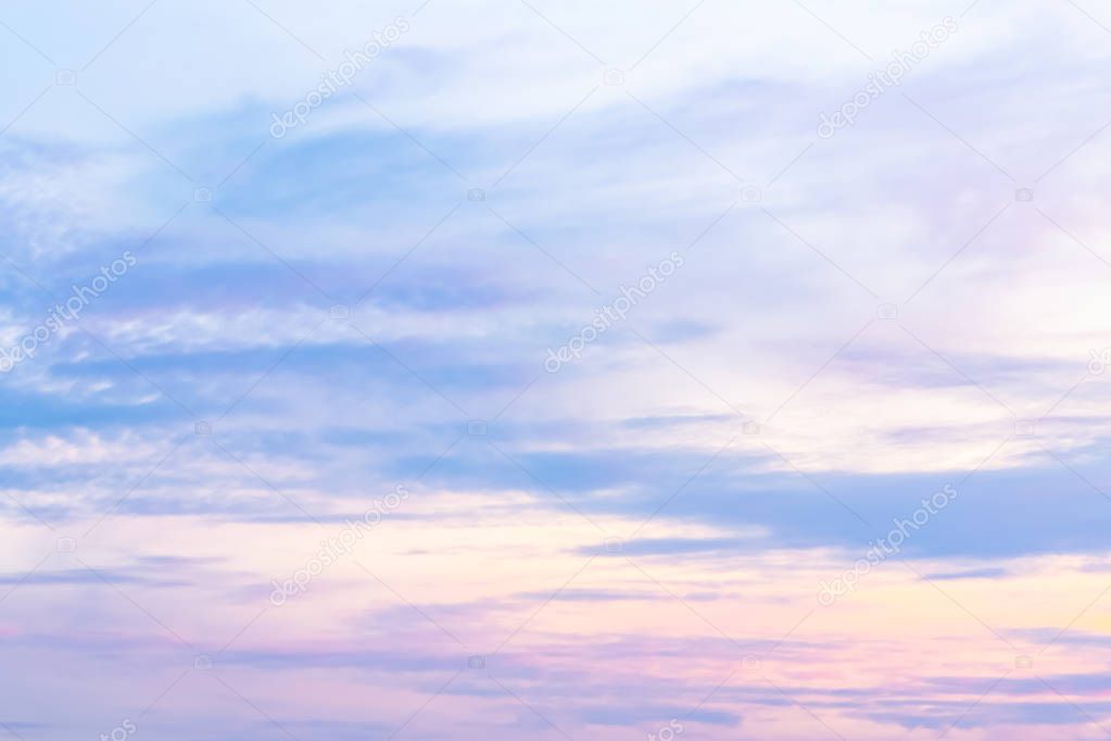 Clouds of the sky and the sun on the evening of summer.