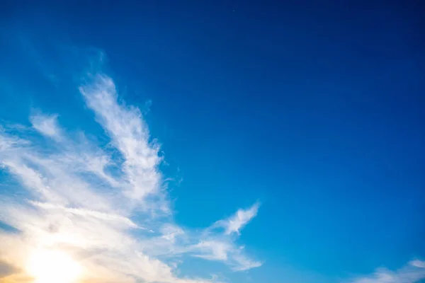 Blue sky with white clouds during the afternoon.