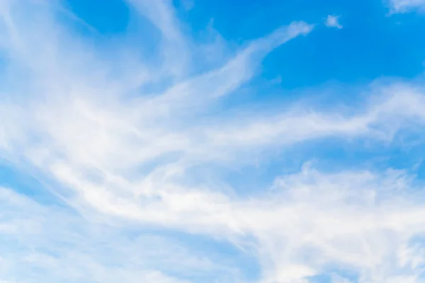 Blue sky with white clouds during the afternoon.