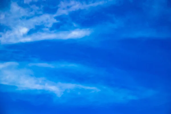 Blue Backdrop Has Some Clouds — Stock Photo, Image