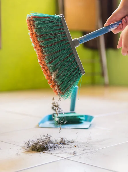 Woman Sweeps Dust Dirt Floor While Cleaning House — Stock Photo, Image